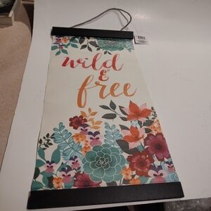 Add a touch of nature to any room with this beautiful hand-painted floral sign.